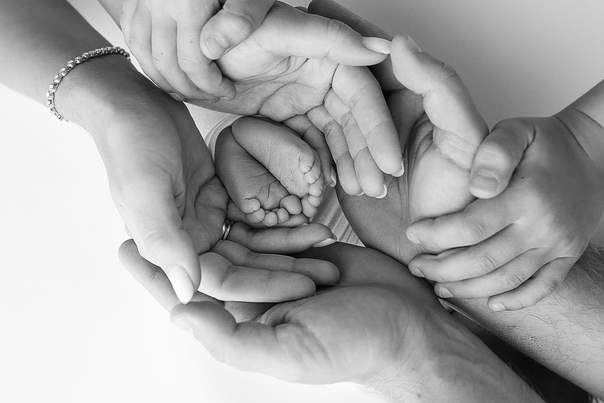 Tiny newborn feet, a hopeful reminder of future family